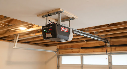 Rendered close-up of a chain drive garage door opener motor unit mounted to a garage ceiling